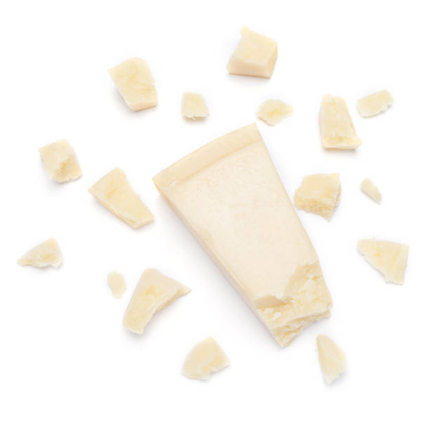 istock pieces of Parmesan cheese on white background 900431074
