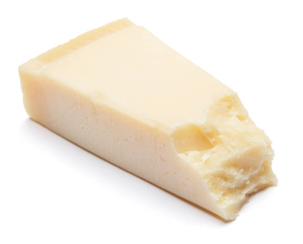 istock pieces of Parmesan cheese on white background 900431112