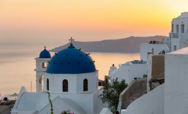 istock Traditional church in Oia, Santorini 900435496