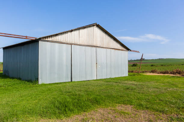 istock Grass Airstrip Aircraft Hangar Farm 900436094