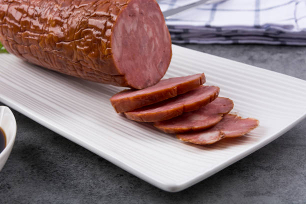 istock Sausage it is isolated on a white background 900438838