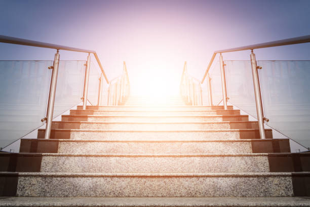 istock stairs going up to the light 900439432
