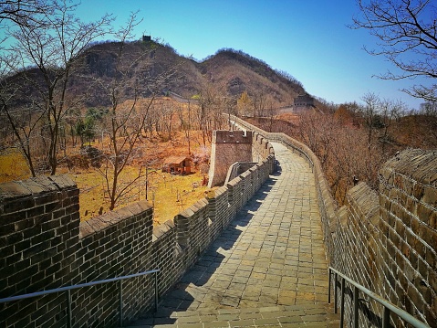 It is the most eastern part of the Great Wall and located on Hushan or Tiger mountain, Dandong city, Liaoning province; near China-North Korea border.
