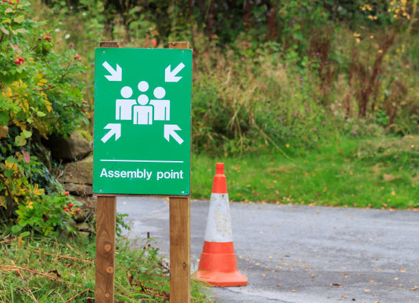 istock Green and white Assembly Point sign 900443530