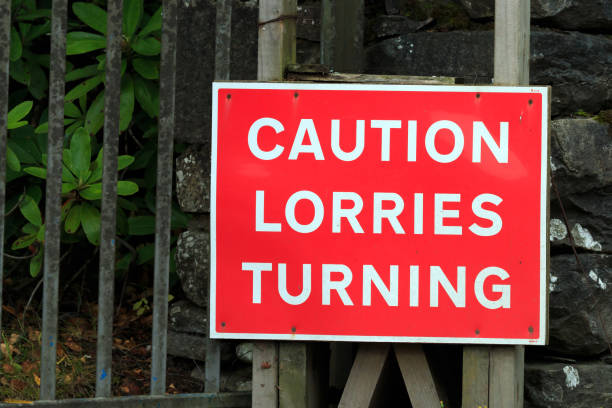 istock Red and white Caution Lorries Turning sign 900443562