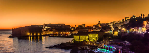 istock Dubrovnik sunset panorama cityscape. 900454206