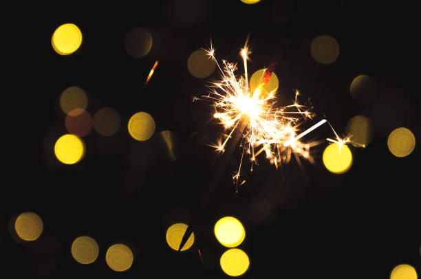 istock Sparlkler used for party on a blurry background 900456904