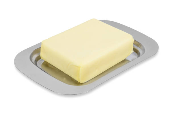 kawałek masła w metalowym pudełku na białym tle - butter dairy product butter dish milk zdjęcia i obrazy z banku zdjęć