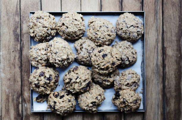 Homemade oatmeal cookies Homemade oatmeal cookies on the old table, Fresh baked chocolate chip oatmeal cookies lactation cookies stock pictures, royalty-free photos & images