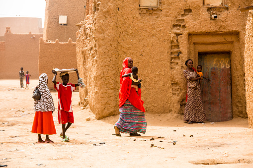 Colorful group of woman walking in the roads of Agadez