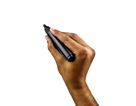 Male hand is ready for drawing with black marker. Isolated on white.