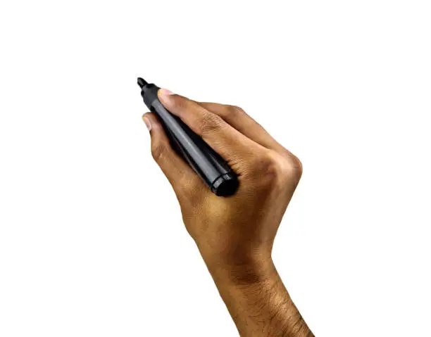 Photo of Man using an black pen