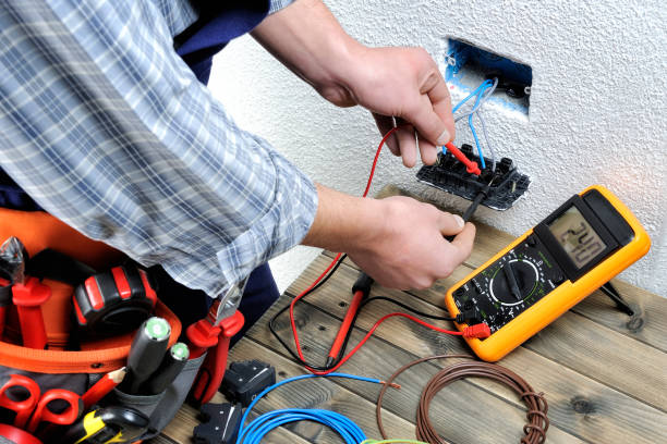 istock Young electrician working in a residential electrical installation 900496624