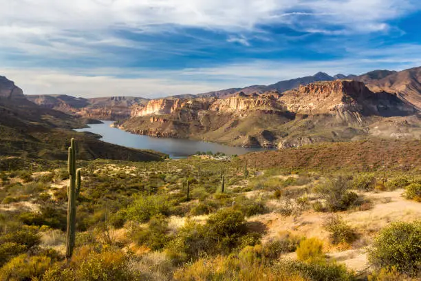 Apache Lake Distant Scenic Desert Landscape while driving historic Apache Trail through Superstition Mountains between Lost Dutchman State Park and Roosevelt Lake in Arizona USA