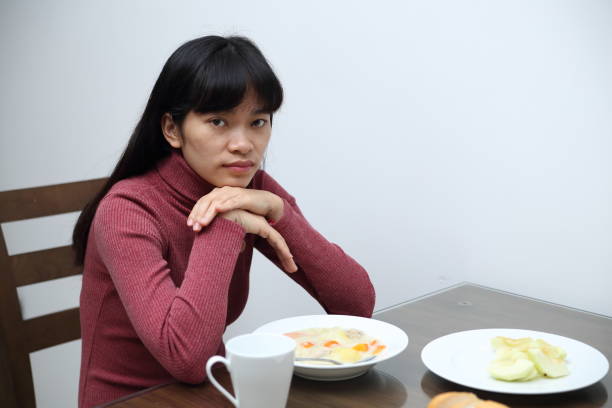 istock The woman eating dinner 900509616