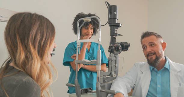 istock Woman getting eye exam 900517112