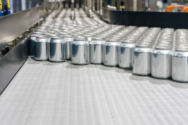 istock Packed cans on the conveyor belt in berverage factory 900520474