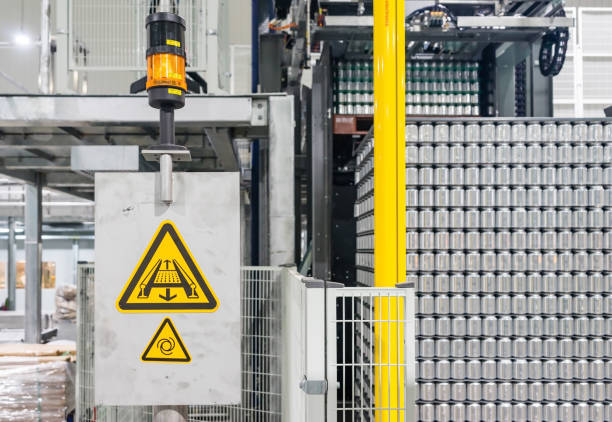 istock Canned food stacking on plastic pallet in Automated High/Low-level Depalletizer Machine 900520482