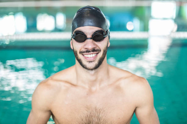 istock Smiling male swimmer 900523376