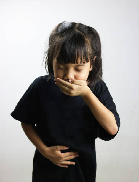 kid girl has vomit or sick stock photo