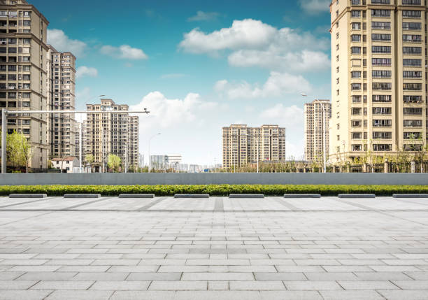 istock Asphalt road and modern city 900537468