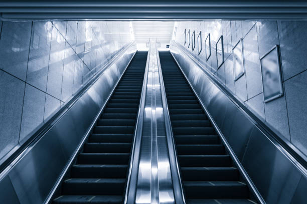 istock modern escalator in shopping center 900537812