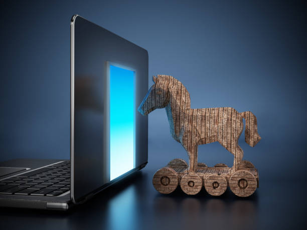 Trojan horse entering door on laptop computer