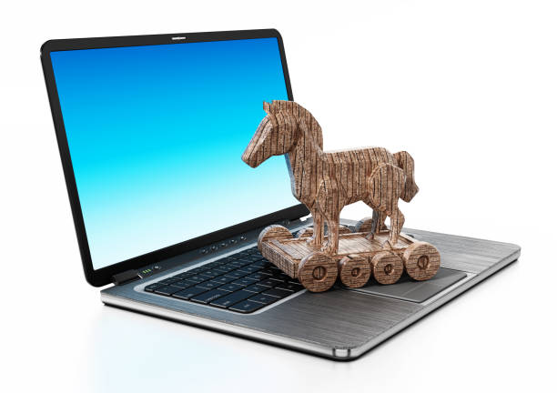 istock Trojan horse standing on laptop computer 900552866