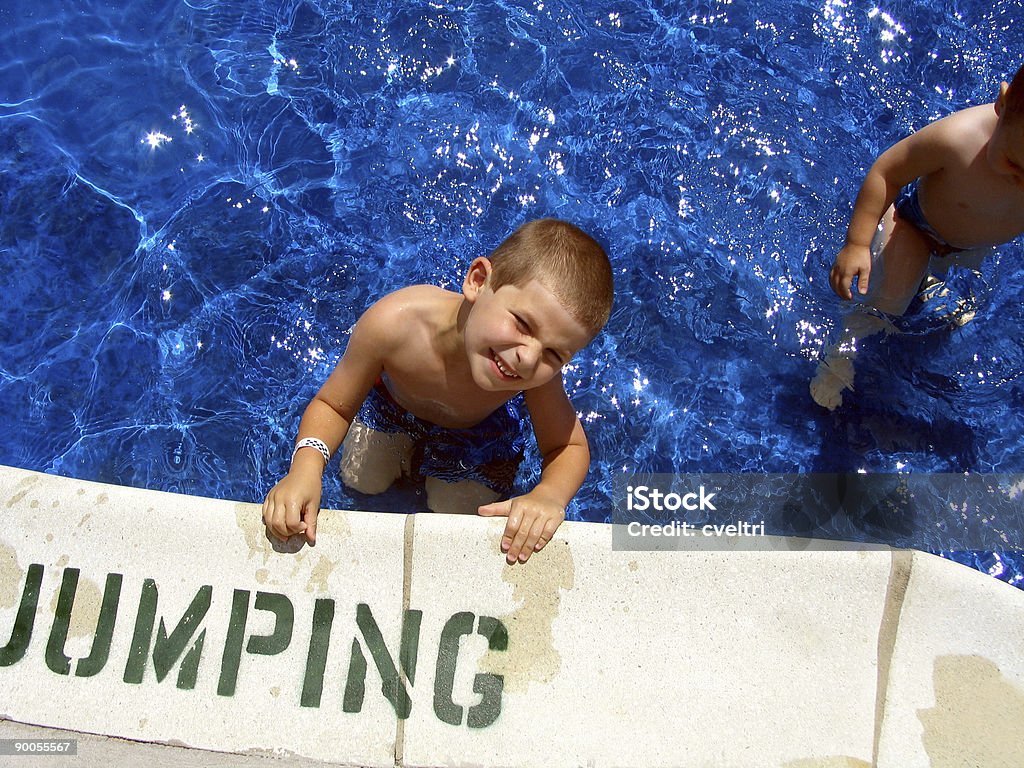 Kids Swimming in a Pool  Baby - Human Age Stock Photo