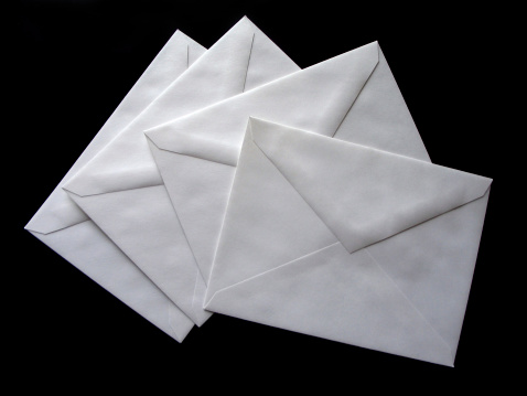 Craft paper envelope isolated on the white background
