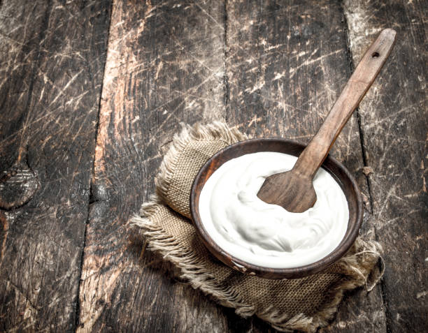 istock Natural yogurt in a bowl. 900565450