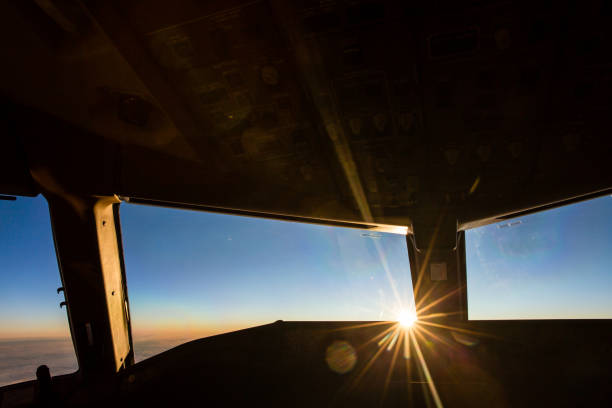 istock Sunrise from the cockpit with the first rays. 900566090