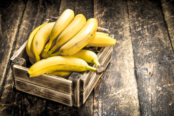 istock box of fresh bananas. 900568644