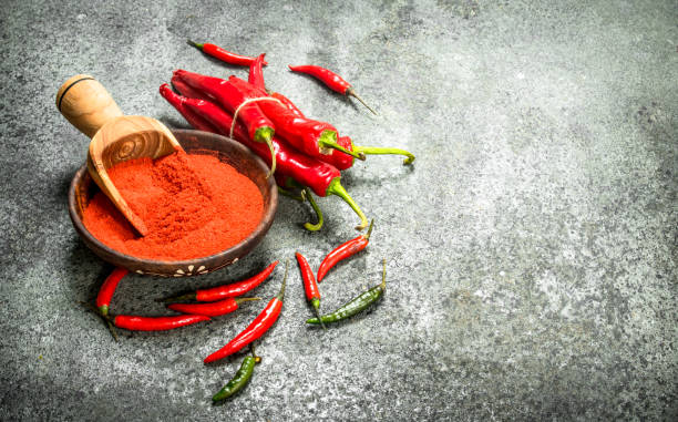 istock Ground chili peppers in a bowl. 900569710