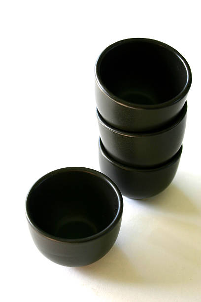 istock four little black bowls stacked 90057173