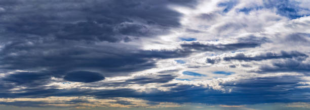 istock panorama rays of the sun dramatic clouds 900572170
