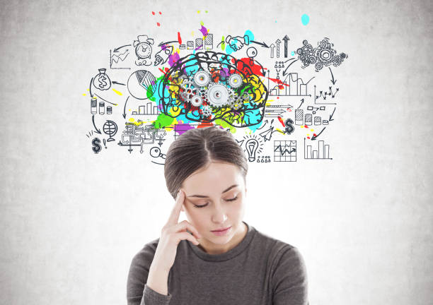 istock Stressed young woman in brown, cog brain 900572620