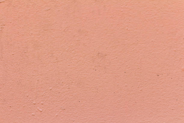 istock wall color pink and orange texture background 900580322