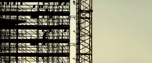 istock silhouette of scaffolding construction site 900580510