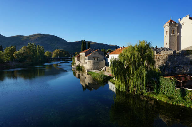 Morning_mediterranean town_clean river Morning_mediterranean town_clean river, old traditional building, peacful stock pictures, royalty-free photos & images