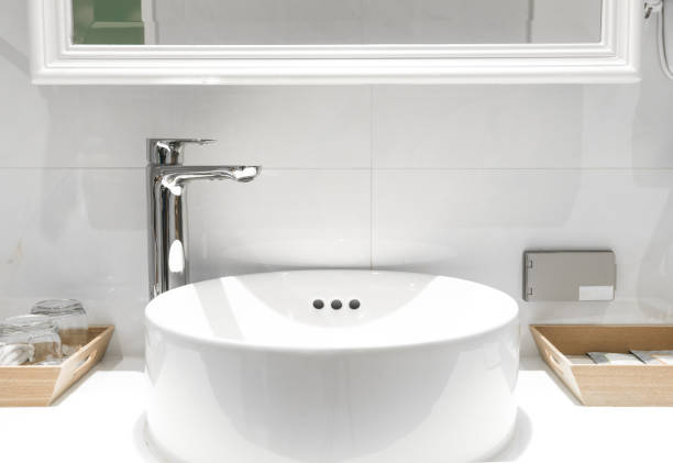 istock Bathroom interior with sink and faucet 900600370
