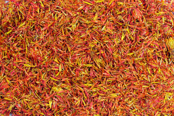 Chinese herbal medicine: Dried Safflower (Carthamus tinctorius), Chinese herbal medicine: Dried Safflower (Carthamus tinctorius), which has the effect for improving blood circulation. It is also a saffron substitute in cooking. substitute for saffron stock pictures, royalty-free photos & images