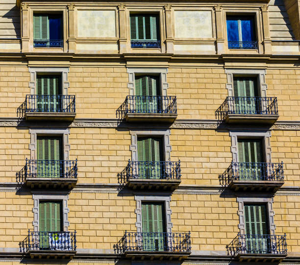 istock Green Shutters on Iron Balconies 900604406