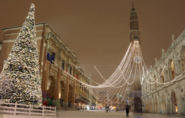 istock Big Christmas tree with snow in Vicenza in Italy 900604472