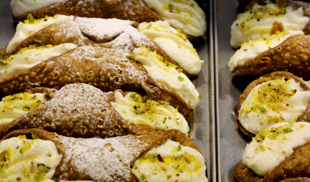 istock many Sicilian cannoli stuffed with ricotta and pistachios 900606768