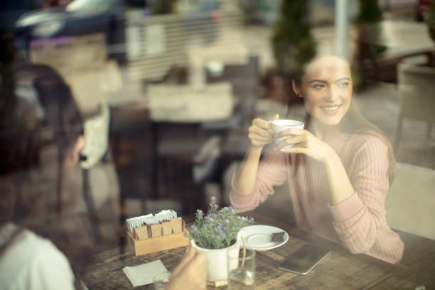 Blurred background of people in co working in the cafe loft style. Top view