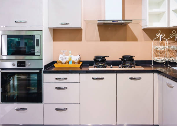 istock Bright modern kitchen with stainless steel appliances. Interior design. 900612344