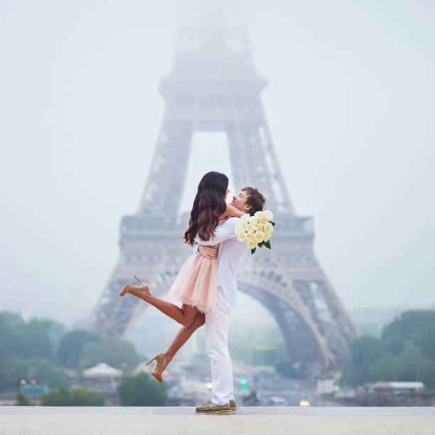 istock Happy couple near the Eiffel tower 900618374