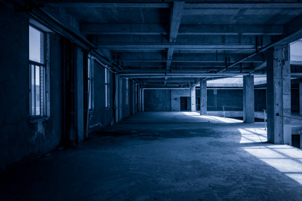 istock corner of old concrete room with blue sky window 900622536