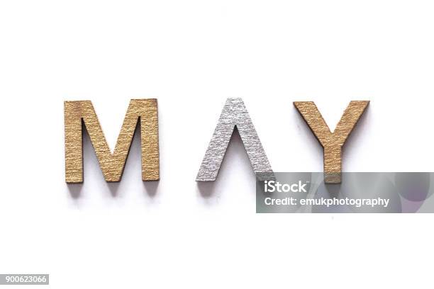 May May Written In Gold And Silver Lettering Stock Photo - Download Image Now - Abbreviation, Alphabet, April